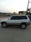A picture of Rav4 milango mitano ipo Mbezi mwisho imepoa Bei mil 11