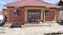 A picture of House for sale nansana kyebando 3bedrooms sitting dining kitchen apple