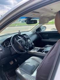 A picture of Mazda CX 9 2011 model with high engine performance and
