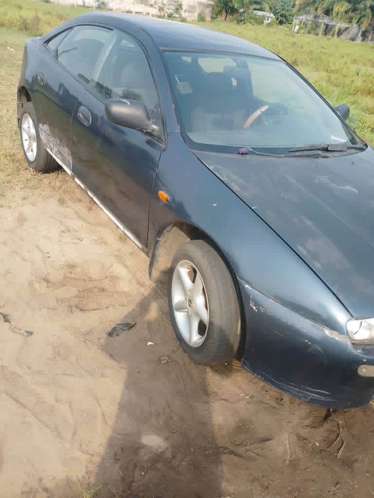 A picture of Mazda 323 in perfect condition 08101444821