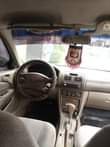 A picture of Tok Standard 02 Toyota Corolla very engine gear AC chilling