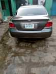 A picture of NIGERIA USED TOYOTA CAMRY 2006 Engine dey smoke AC compressor