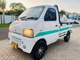 A picture of SUZUKI CARRY DMG Cc 650 Rim Sports Manual gear Bei