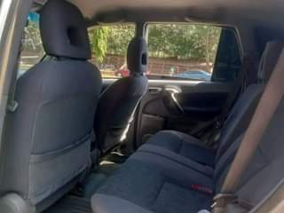 A picture of 2003 TOYOTA RAV 4 07086327174 SPARKLING CLEAN EXTERIOR NEAT INTERIOR