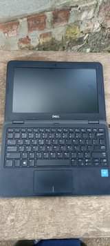A picture of Dell latitude Celeron portable laptop at 450 000