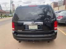 A picture of Honda pilot 2010 very clean everything working perfectly AC chilling