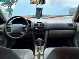 A picture of Super Clean Nigerian Used Toyota Corolla okereju owo lo Repainted