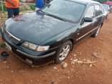 A picture of Mazda 626 for sale Good body and clean interior Sound