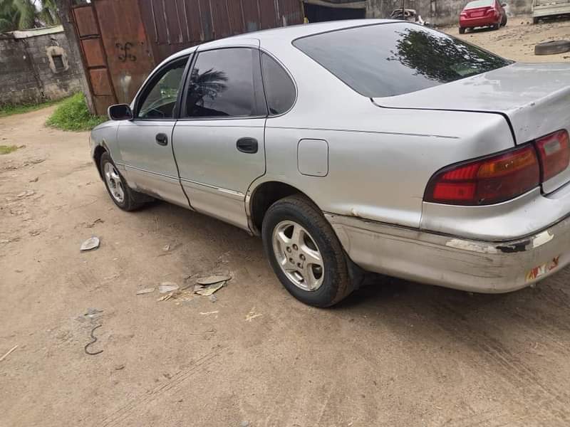 A picture of SHARP 1999 MODEL TOYOTA AVALON First Body Sound Engine Smooth