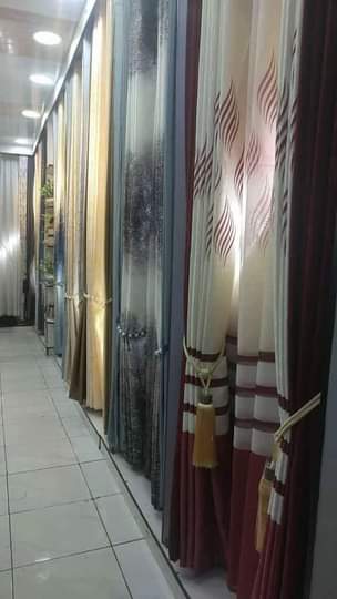 A picture of CURTAINS NETS AND RODS