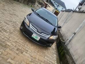 A picture of Sharp clean Toyota corolla 2013 model Buy n drive nothing