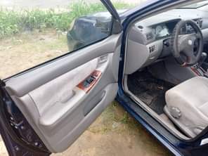 A picture of Neatly used Toyota Corolla 2004 model available for sale Engine