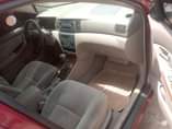 A picture of Sharp Toyota Corolla LE 2006 Red