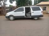 A picture of Toyota sienna 2000 model for sale Super clean body Sound