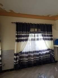 A picture of CURTAINS CARPETS