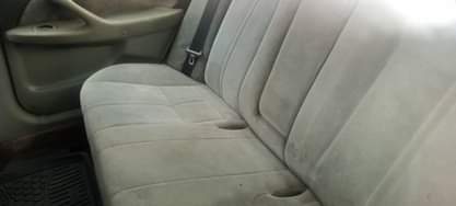 A picture of Neatly used buy and drive Toyota Camry with nothing to