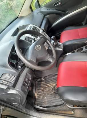 A picture of Toyota corolla verso neatly and private used Contact no 07060556880