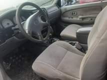 A picture of Toyota Tacoma 05 model with auxillary gear pure first body