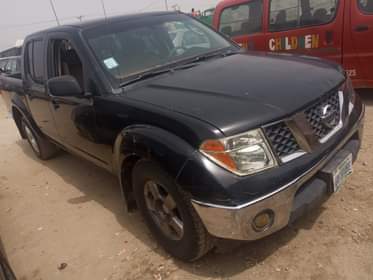 A picture of Nissan Frontier SE 2005 model 4 sale Clean first body
