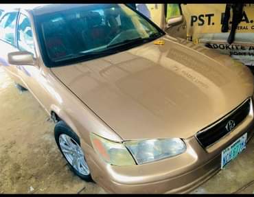A picture of TOYOTA CAMRY TINY BIG ENGINE GEAR AC BODY OKAY PRICE