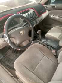 A picture of Toyota Camry 2004 model on belts engine is 70 gear