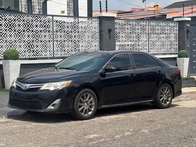 A picture of Neatly Used 2014 Toyota Camry Le available 10m Ojodu Berger