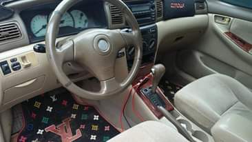A picture of Toyota Corolla for sale everything is working perfectly 08039507567
