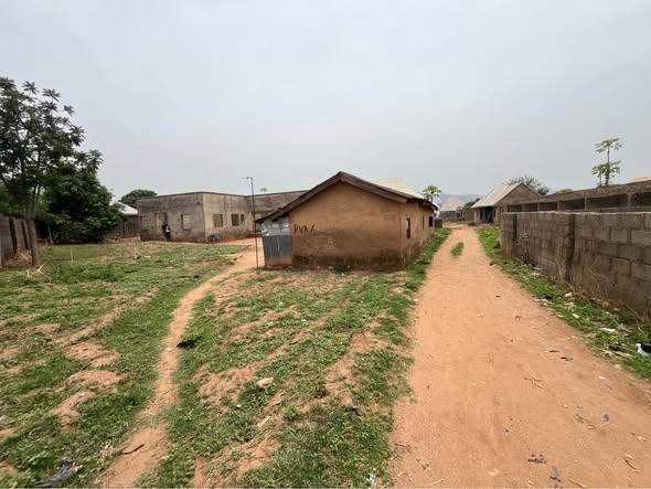 A picture of 1000 SQM LAND WITH TWO BUILDINGS GOING FOR 36M