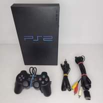 A picture of playstation 2 with 2 controllers and cables plus 10 games