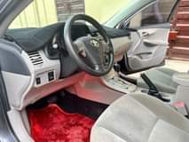 A picture of AWOOF AWOOF AWOOF AWOOF OWNER NEEDS MONEY FASTEST FINGER TOYOTA