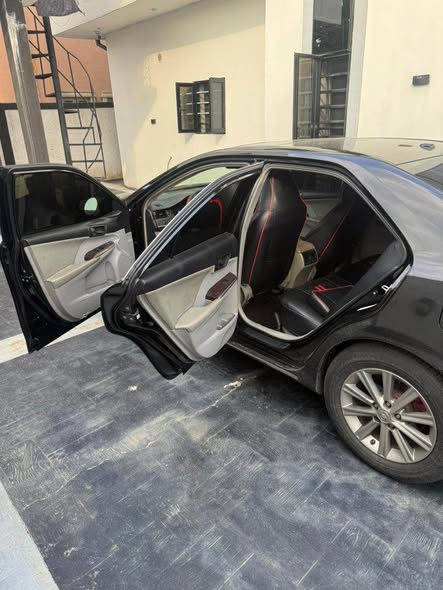 A picture of Toyota Camry 2014 XLE four plugs keyless first user distress