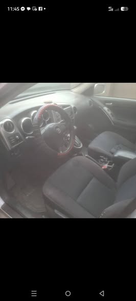A picture of First body Toyota matrix engine and gear AC is working