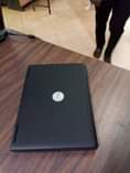 A picture of Dell laptop with strong battery at 230k