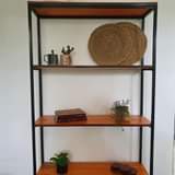 A picture of Iron wooden shelves