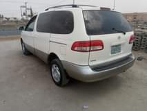 A picture of Toyota Sienna 2002 model Clean body and interior Sound untouched