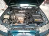 A picture of Toyota Camry tiny light Sound engine and Gear Ac is