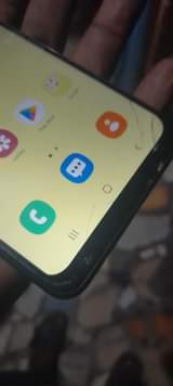 A picture of Samsung A12 mpyaaa storage64 Ram4 Battery mAh5000 fingure print pembeni