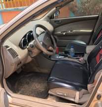 A picture of STILL AVAILABLE Clean Nigerian Used Gold Nissan Altima 2004 Baked