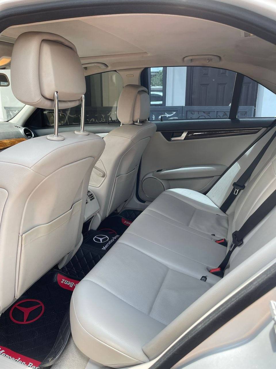 A picture of 2012 Mercedes Benz C250 super clean AC chilling everything intact.