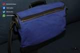 A picture of KAIA Leather 16 leather and canvas combo laptop and stationary