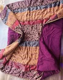 A picture of UK used bedcovers and duvets