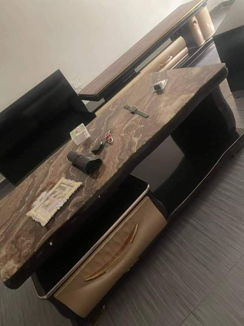 A picture of Foreign Center table and TV Stand