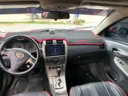 A picture of Clean Belgium Standard Escape Corolla 2010 model with everything working