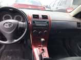 A picture of 2011 Corolla on a total distress sale extremely clean
