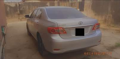 A picture of 010 Toyota Corolla brought brand new working perfectly fine manual