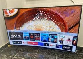 A picture of Fairly Used Samsung 55inches UHD Curved tv Flat screen On