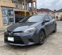 A picture of EXTREMELY SOUND PRE OWNED 2015 TOYOTA COROLLA LE SMOOTH DRIVE
