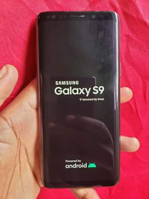A picture of SAMSUNG S9. AT 240000. FIXED PRICE 