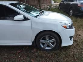 A picture of White Toyota Camry 2012