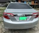 A picture of 2014 Toyota Camry Straight body neat interior Sound engine and